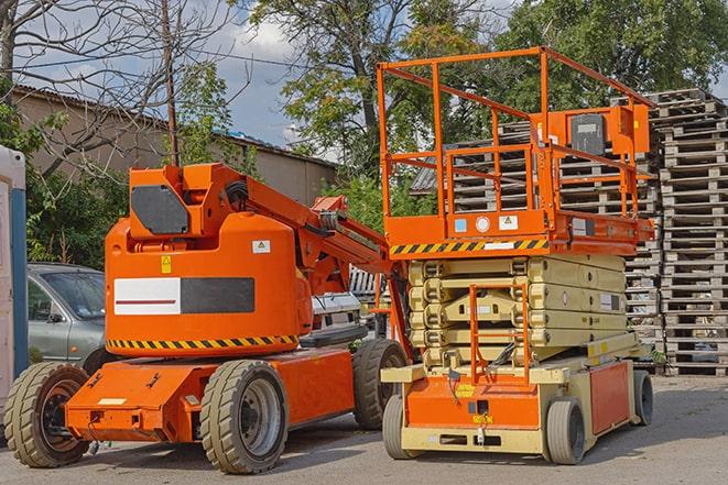 forklift lifting materials in a shipping warehouse in Alamo